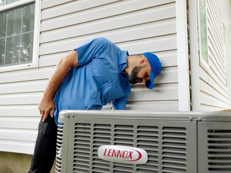 Perfect Air tech installing Lennox AC